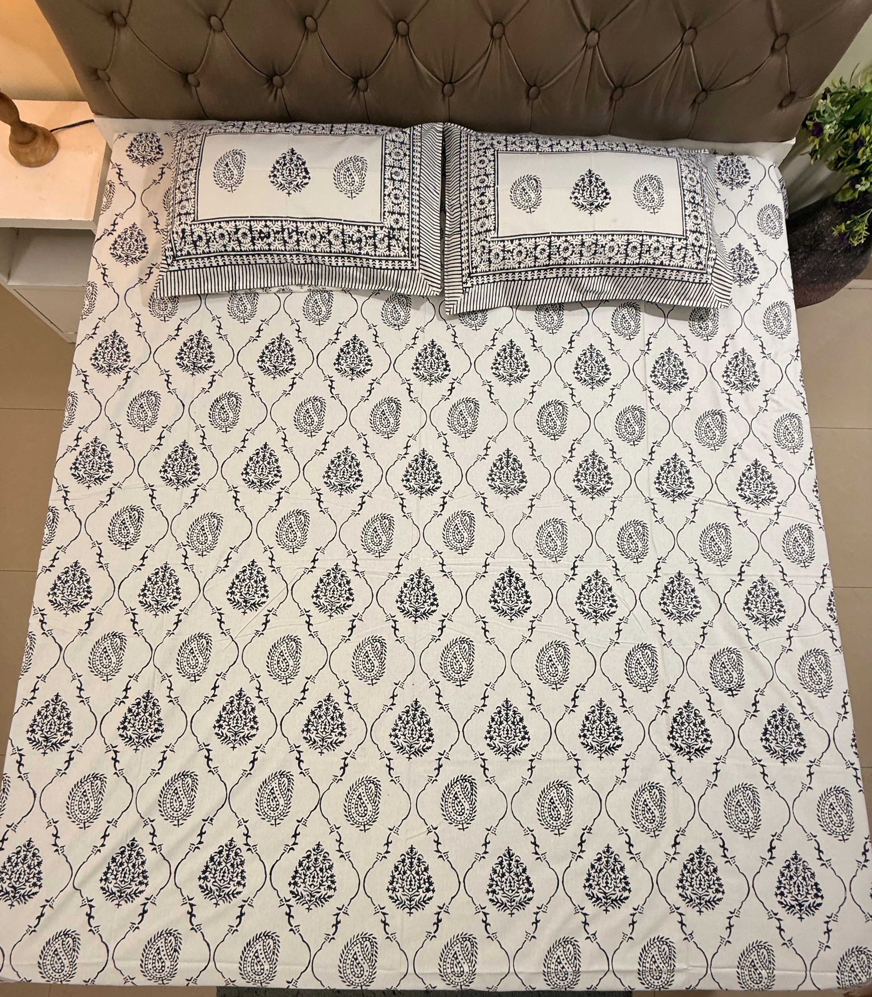 Hand block print on premium south cotton fabric bedsheet (Dark Blue Ambi on White base)