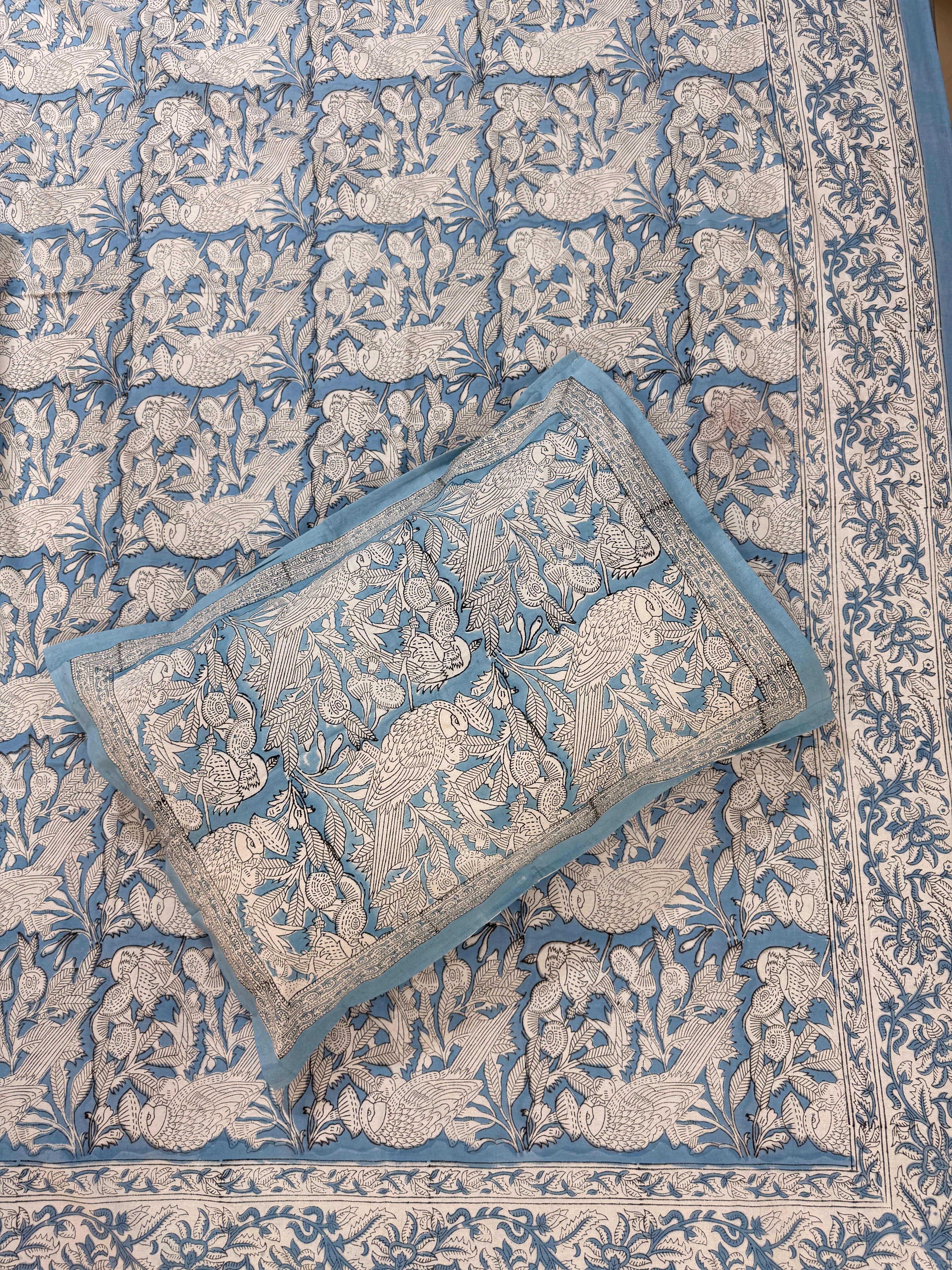 Hand block print on premium south cotton fabric bedsheet ( Eagle print in chalk blue shade)