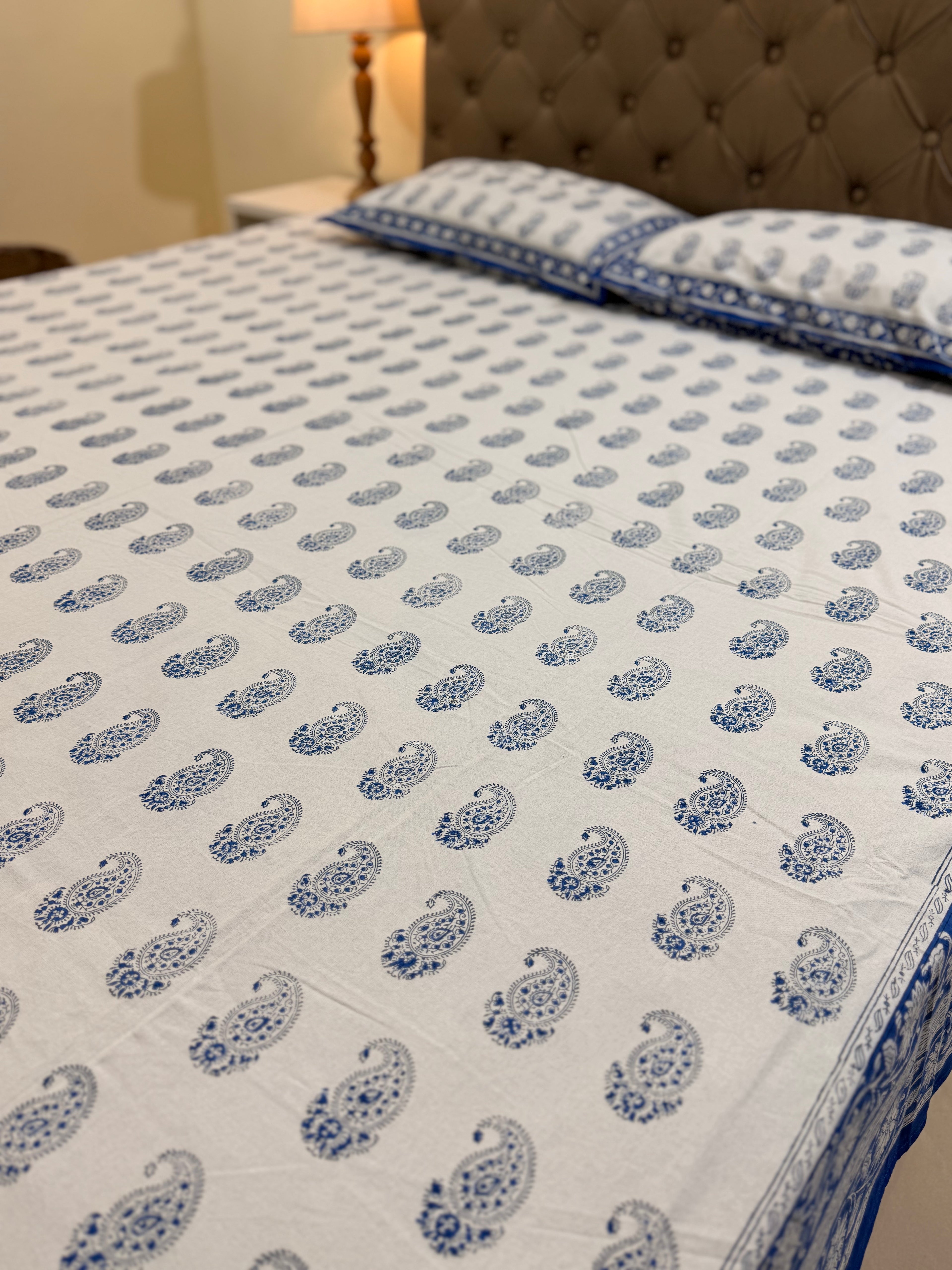 Hand block print on premium south cotton fabric bedsheet (All over Indigo blue Ambi print)